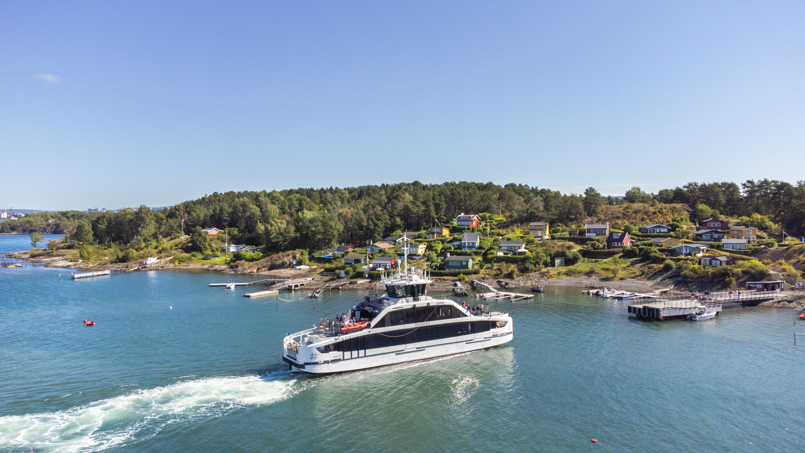 The new, all-electric island ferry on its way to shore.